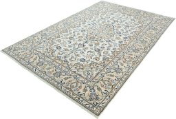 Corner detail of 2000s Kashan rug showing border pattern and Wool pile