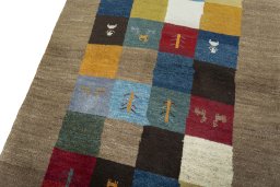 Backside of handmade 2000s Persian Gabbeh rug showing knot structure and weave density