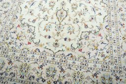 Close-up detail of New Kashan rug from Iran / Persia showing Wool weave
