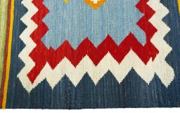 Close-up detail of New Kilim Sofre rug from Turkey showing Wool weave