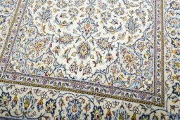Close-up detail of 2000s Kashan rug from Iran / Persia showing Wool weave