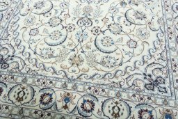 Close-up detail of 2000s Nain rug from Iran / Persia showing Wool weave