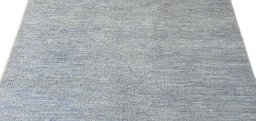 Backside of handmade New Morocco rug showing knot structure and weave density
