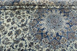 Close-up detail of 2000s Nain rug from Iran / Persia showing Wool weave