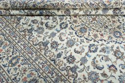 Close-up detail of 2000s Kashan rug from Iran / Persia showing Wool weave