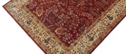 Backside of handmade New Farahan rug showing knot structure and weave density