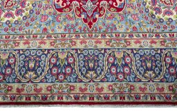Full view of 1970s Kerman rug from Iran / Persia, 395 × 302 cm in Red tones