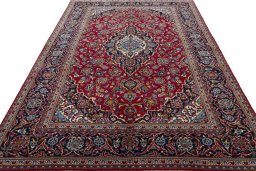 Surface texture of 2000s Kashan rug with natural Wool and intricate pattern