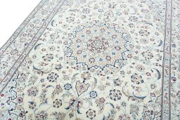 Backside of handmade 2000s Nain rug showing knot structure and weave density