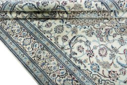 Close-up detail of 2000s Nain rug from Iran / Persia showing Wool weave