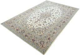 Corner detail of 2000s Kashan rug showing border pattern and Wool pile