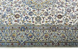 Close-up detail of 2000s Kashan rug from Iran / Persia showing Cork weave
