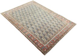 Close-up detail of 1950s Ghom rug from Iran / Persia showing Wool weave