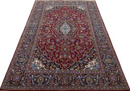 Surface texture of 2000s Kashan rug with natural Cork and intricate pattern