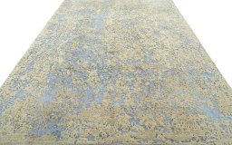 Surface texture of 1950s Vintage rug with natural Wool and intricate pattern