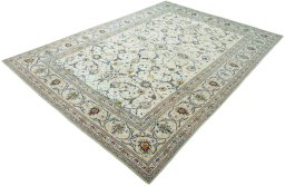 Corner detail of 2000s Kashan rug showing border pattern and Wool pile
