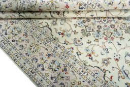 Close-up detail of New Kashan rug from Iran / Persia showing Wool weave