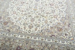 Close-up detail of 2000s Kashan rug from Iran / Persia showing Wool weave