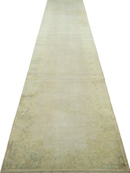 Surface texture of 1950s Vintage rug with natural Wool and intricate pattern