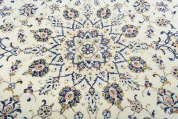 Central medallion detail of New Kashan rug from Iran / Persia