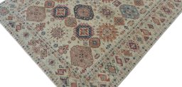 Backside of handmade New Kazak rug showing knot structure and weave density