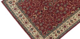 Backside of handmade New Farahan rug showing knot structure and weave density