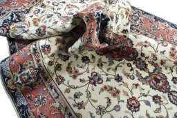 Surface texture of 2000s Kashan rug with natural Wool and intricate pattern