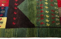 Close-up detail of 2000s Persian Gabbeh rug from Pakistan showing Wool weave
