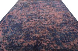 Surface texture of 1970s Vintage rug with natural Wool and intricate pattern