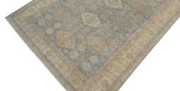 Backside of handmade New Kazak rug showing knot structure and weave density