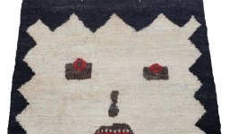 Backside of handmade New Morocco rug showing knot structure and weave density