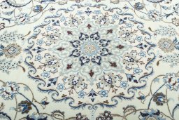 Central medallion detail of 2000s Nain rug from Iran / Persia