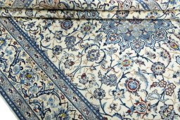 Close-up detail of 2000s Nain rug from Iran / Persia showing Wool weave