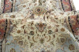 Surface texture of New Tabriz 50/60/70 Raj rug with natural Cork and intricate pattern