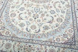 Close-up detail of 2000s Nain rug from Iran / Persia showing Wool weave