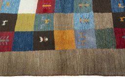 Close-up detail of 2000s Persian Gabbeh rug from Pakistan showing Wool weave