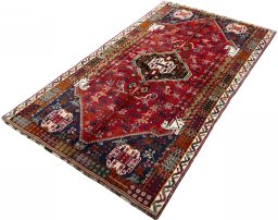Corner detail of 1970s Shiraz rug showing border pattern and Wool pile