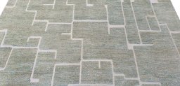 Backside of handmade New Morocco rug showing knot structure and weave density