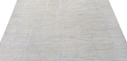 Backside of handmade New Morocco rug showing knot structure and weave density