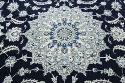 Central medallion detail of New Nain rug from Iran / Persia