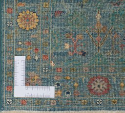 Corner detail of New Farahan rug showing border pattern and Wool pile