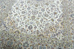 Close-up detail of 2000s Kashan rug from Iran / Persia showing Wool weave