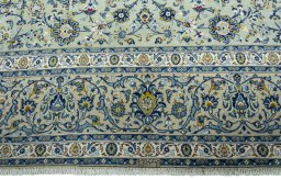Full view of 2000s Kashan rug from Iran / Persia, 430 × 325 cm in Green tones