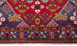 Close-up detail of 2000s Meymeh rug from Iran / Persia showing Wool weave