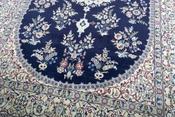 Close-up detail of 2000s Nain rug from Iran / Persia showing Wool weave