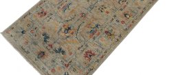 Backside of handmade New Farahan rug showing knot structure and weave density