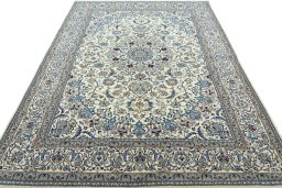Surface texture of 2000s Nain rug with natural Wool and intricate pattern