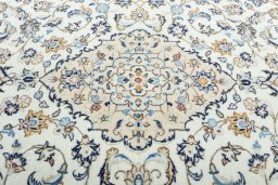 Central medallion detail of 2000s Kashan rug from Iran / Persia