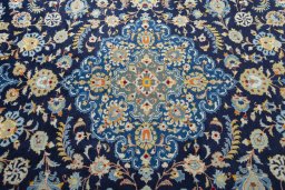 Central medallion detail of 2000s Kashan rug from Iran / Persia