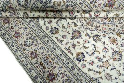 Close-up detail of 2000s Kashan rug from Iran / Persia showing Wool weave